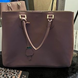 A beautiful lady bag can be used for work or a night out, great for your laptop.